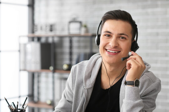 Man with headphones working in office