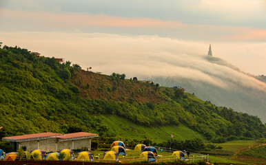 Fog with mountains, beautiful sunrise at Phu thap berk, Phetchabun, Thailand. August 2020. 