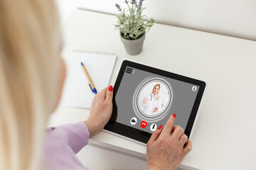 Headshot portrait application screen view of female doctor or talk consult client online on computer, woman nurse speak with sick patient on video call use Webcam conference on laptop