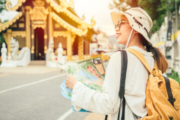 Obraz premium Asian tourist girl teen travel in temple at Chiang Mai province Thailand