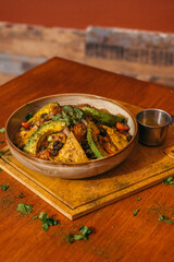 nachos tartar in the plate with avocado