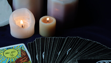 candle flame in the dark tarot cards background.