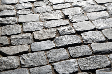 An ancient pavement lined with stone paving stones.