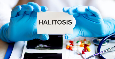 text HALITOSIS write on a medicine card. Medical concept