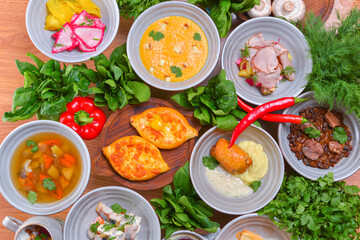 View from above of georgian cuisine on brown wooden table. Top view. Copy space for text.