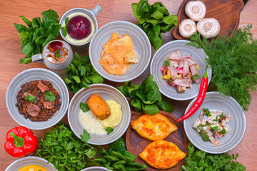 View from above of georgian cuisine on brown wooden table. Top view. Copy space for text.