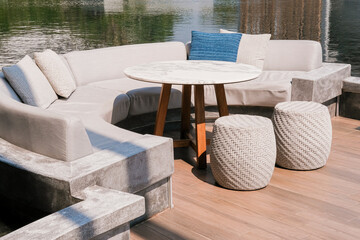 Lounge zone in the hotel near the swimming pool. Leisure time. Hotel business, travel concept, travelling. Empty seats.