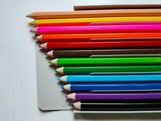 color pencils on a white background