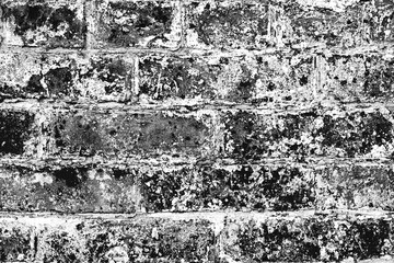 Obraz premium Texture of a brick wall with cracks and scratches which can be used as a background