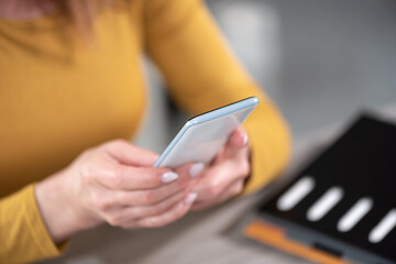 Woman using her mobile phone