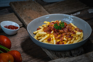 
French fries sprinkled with bacon
