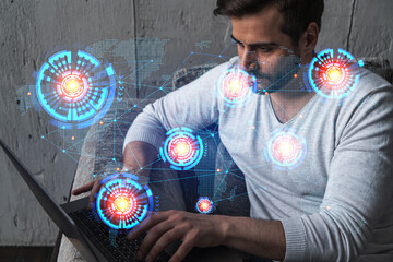 A serious caucasian manager in casual wears, using laptop to develop a new worldwide supply chain. Double exposure. globe and map hologram.