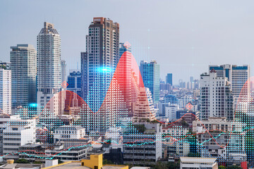 Obraz premium Forex and stock market chart hologram over panorama city view of Bangkok, the financial center in Asia. The concept of international trading. Double exposure.