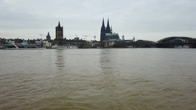 panning shot of high water of Rhine river in Cologne, Germany