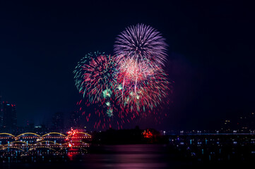 Beautiful Fire works show and reflection on the river,