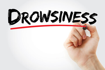 Drowsiness text with marker, medical concept background