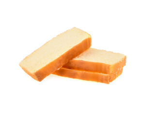 Sliced butter cake on white background
