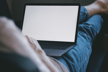 Working process concept, close-up of male hands typing text message on laptop keyboard,  young male freelancer working from home on portable computer, man checking email via laptop