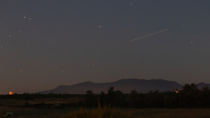 ISS white track in the night sky over Vallespir France
