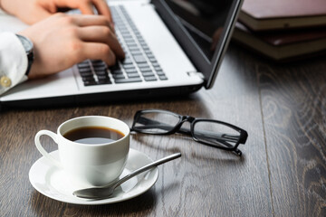 Businessman working at laptop computer