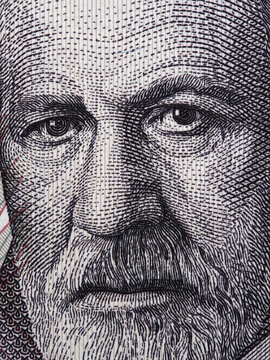 Sigmund Freud face portrait on Austria 50 schilling banknote closeup macro. Austrian neurologist and the founder of psychoanalysis.