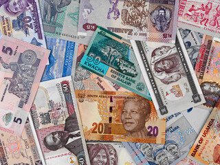 Africa money, heap of various african banknotes, currency background
