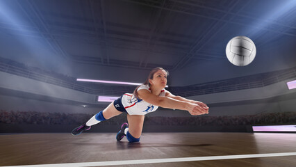 Fototapeta na wymiar Female professional volleyball players in action on 3d stadium.