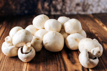 Mushrooms on a wooden background close up