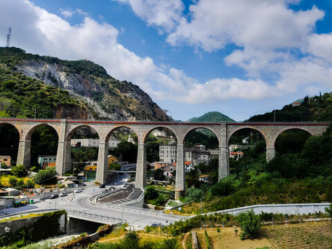 Genova, Italy &ndash; 07/30/2020: Beautiful scenic aerial view of the city, port, dam, sea, Cristoforo Colombo airport runway, containers shipping terminal, Pra, Voltri, and Sestri promontory