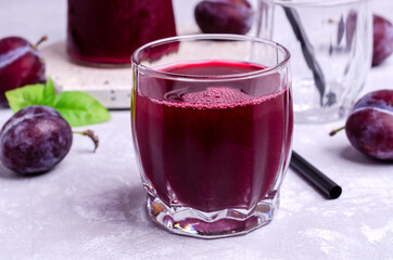 Red plum juice in glass