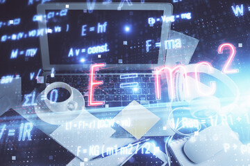 Desktop computer background and formula hologram writing. Double exposure. Education concept.