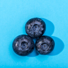 Blueberry. Fresh berries  on blue background. Close up