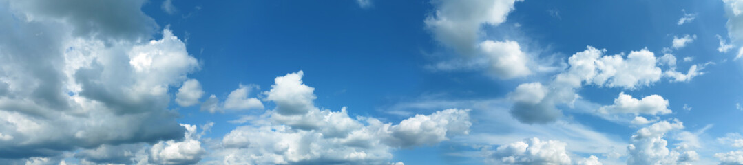 Panoramic blue sky background with white clouds