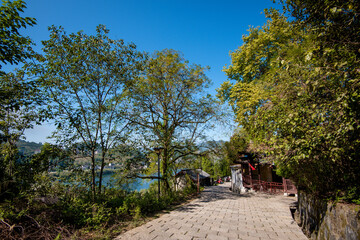 Street view local visitor and tourist in Furong Ancient Town (Furong Zhen, Hibiscus Town), China. Furong Ancient Town is famous tourism attraction place.