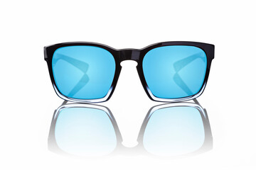 Sunglasses with blue tinted lenses and black frames on white background