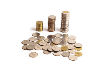 A collection of Thai  baht coins on a white background and clipping path. This coin is denominated in Thai baht. Arrange the coins into a bar chart showing business and financial growth.