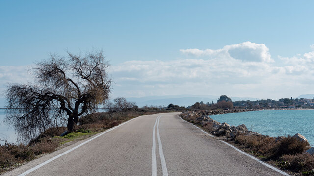 A road through the sea leads to Koronisia, an island in Epirus, Greece.
