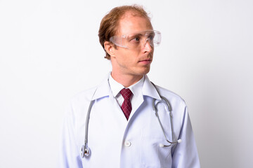 Portrait of man doctor with blond hair as scientist