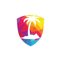 Tropical beach and palm tree logo with shield shape design. shield palm tree vector logo design