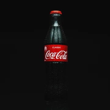 Russia, Moscow, August 05, 2020: Coca Cola classic glass bottle of on a  dark black background Stock Photo | Adobe Stock