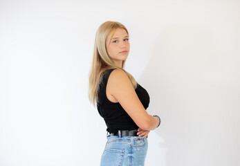 Portrait of a beautiful blonde girl on white background