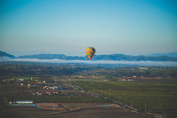 areal view of rolling hills on a hot air balloon in Temecula southern california early morning ride sunrise 