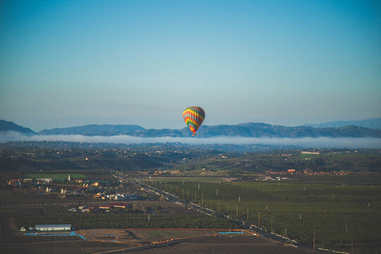 areal view of rolling hills on a hot air balloon in Temecula southern California early morning ride sunrise stock photo royalty free 