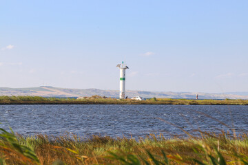 Fototapeta na wymiar Lighthouse in soft light, panoramic view 