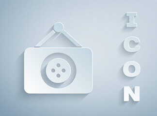 Paper cut Tailor shop icon isolated on grey background. Paper art style. Vector Illustration.