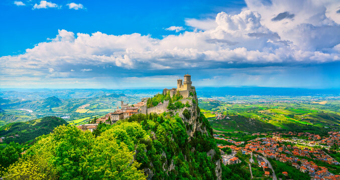 San Marino, medieval tower on a rocky cliff and panoramic view of Romagna