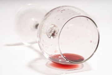 A glass of red wine on white background