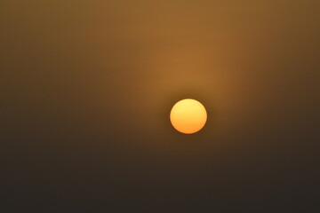 A view of sunset from Baniyas,Abu Dhabi.Golden color dramatic sky.