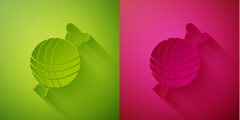 Paper cut Yarn ball with knitting needles icon isolated on green and pink background. Label for hand made, knitting or tailor shop. Paper art style. Vector Illustration.