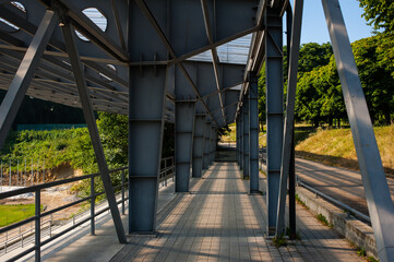 Metal construction for protection from the sun and rain